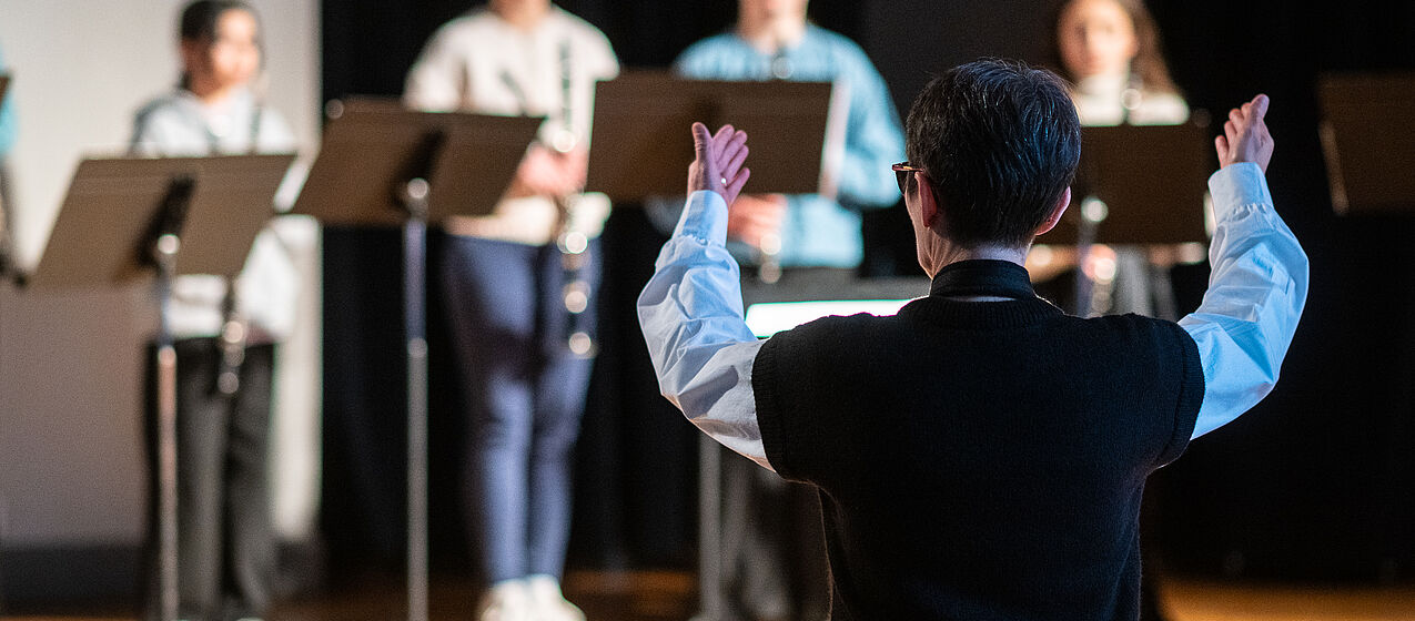 chef d'orchestre de dos